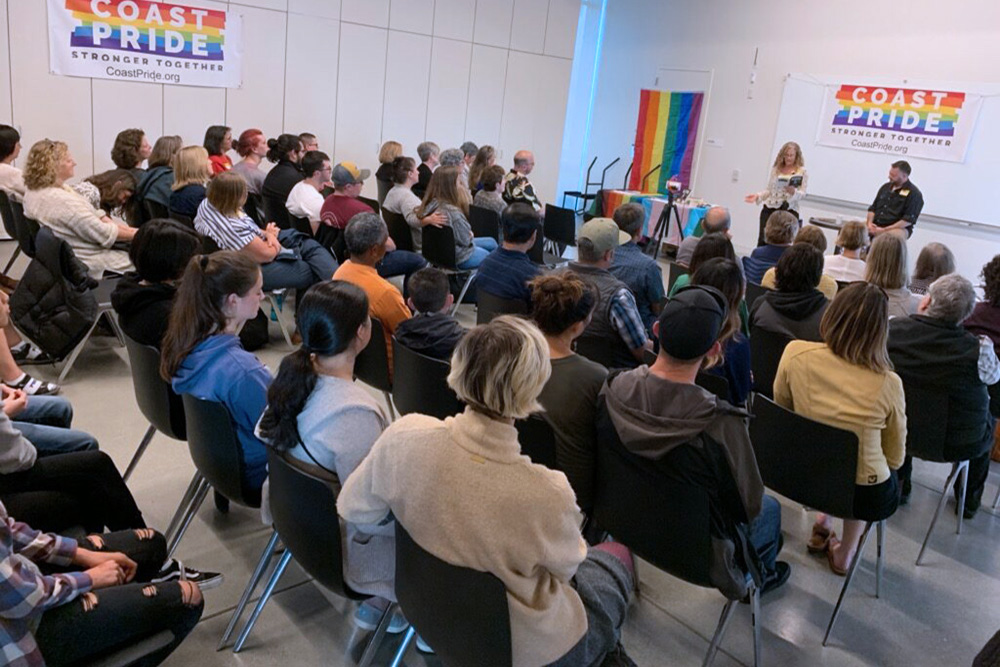 seated group of adults facing a speaker